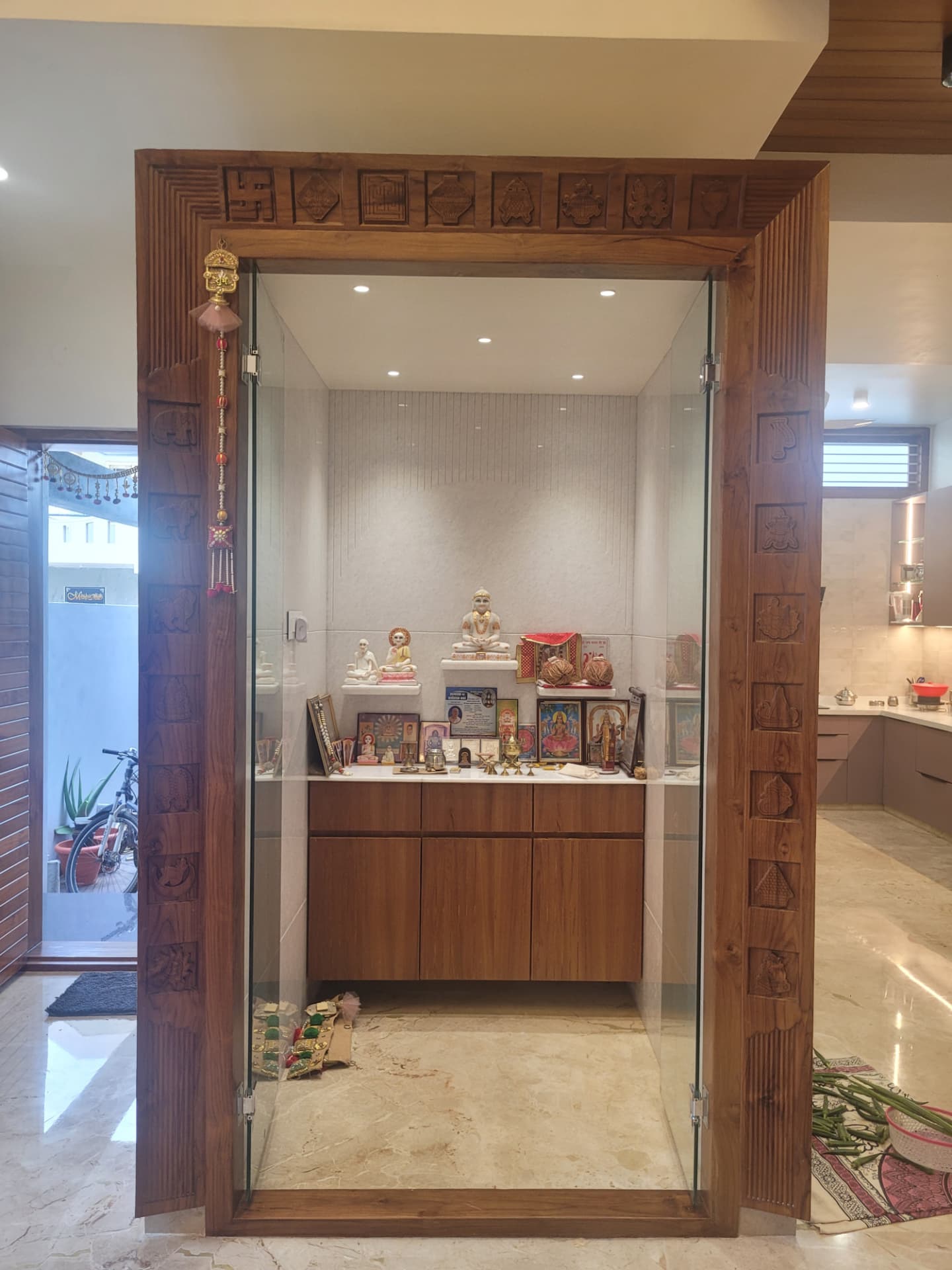 Mr. Praveen's Residence — Carved teak pooja room