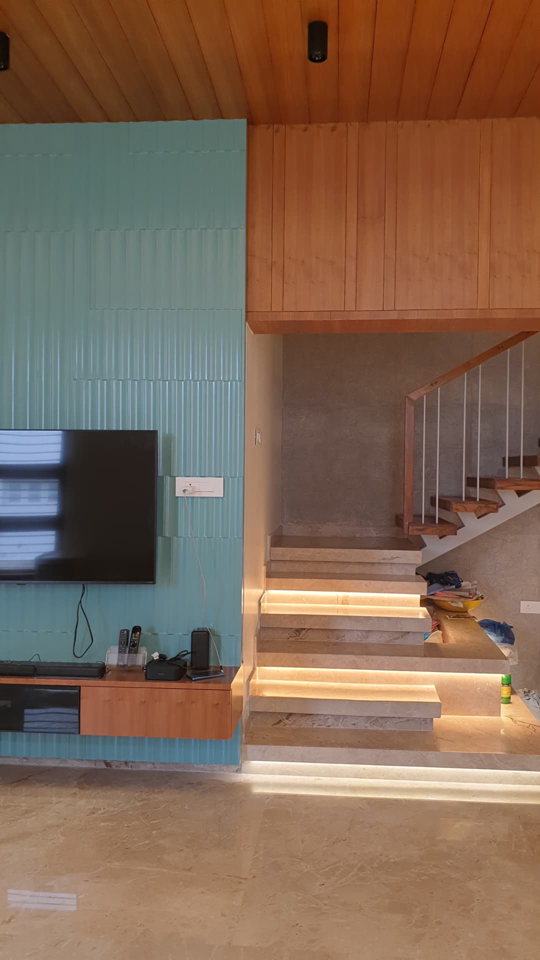 Mr. Praveen's Residence — Living area & floating stair