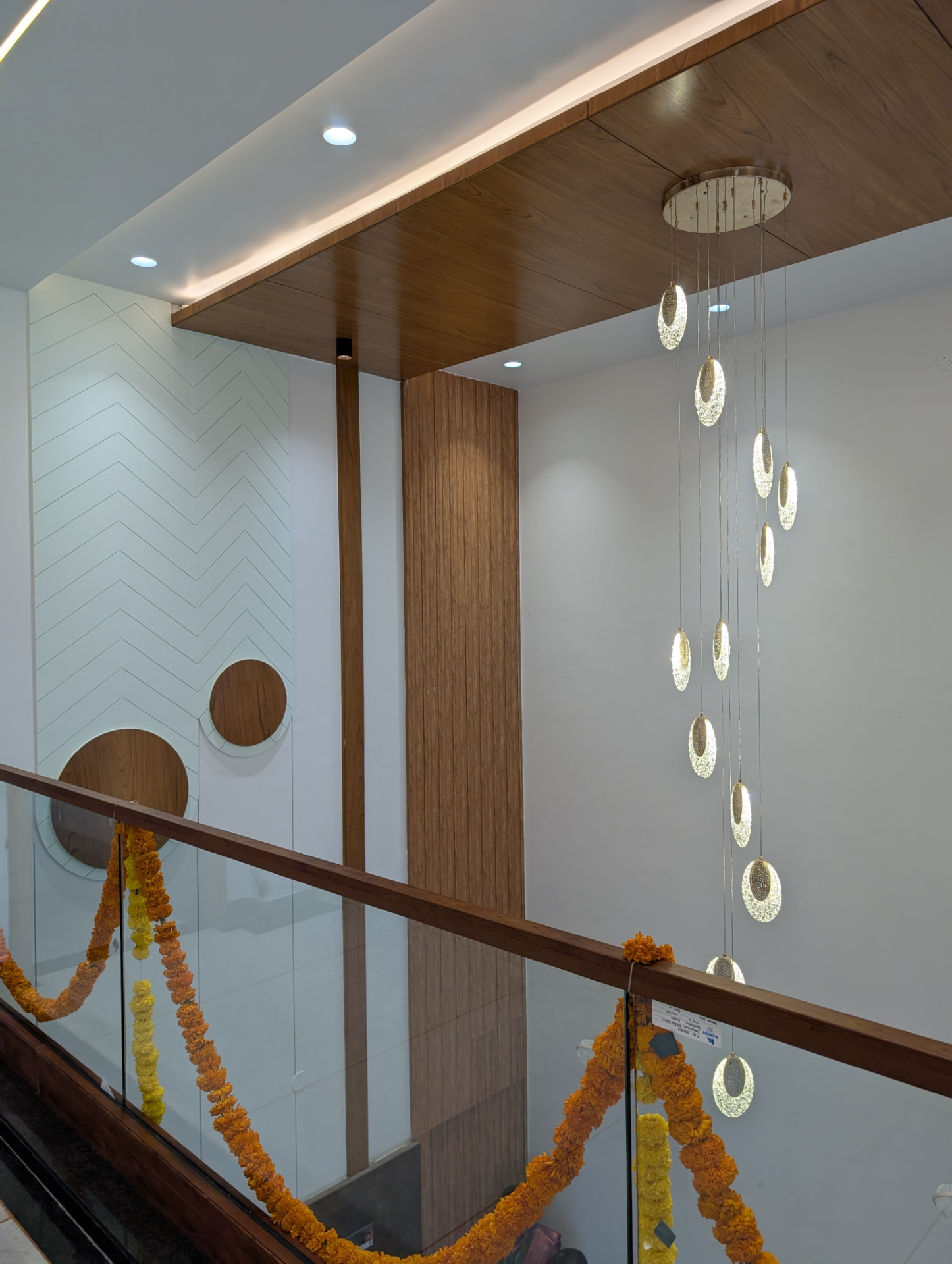 Mr. Vijay Prakash's Residence — Atrium & cascading chandelier